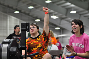 Special Olympics athlete celebrates a great row
